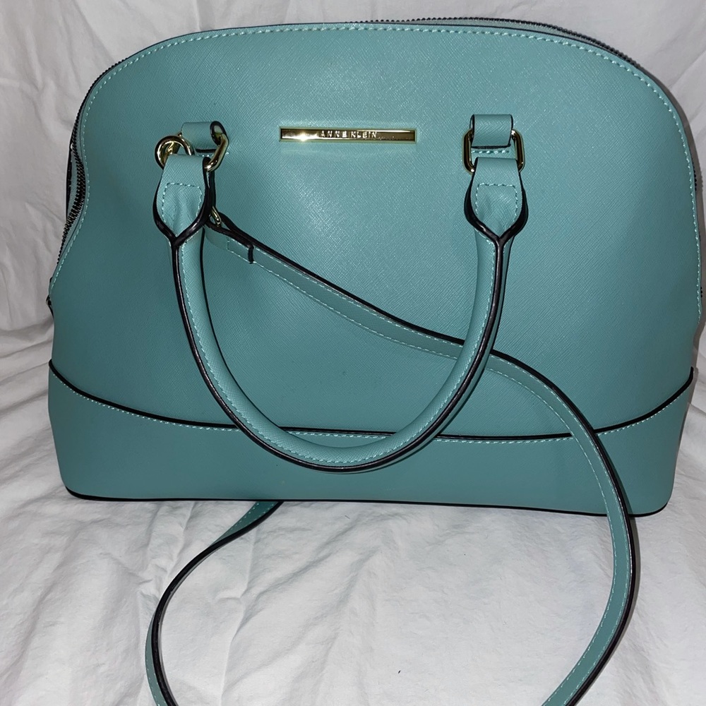 Blue leather Anne Klein purse.